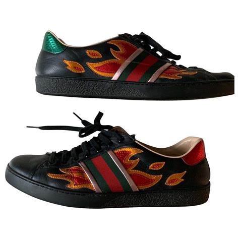 gucci black flames.